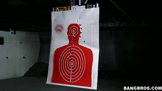 Naked girl Remy LaCroix practicing with some pistols