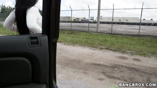 Kiara Mia in a red tight shorts showing off that big booty