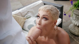 Ryan Keely gives blowjob to Danny D outdoors